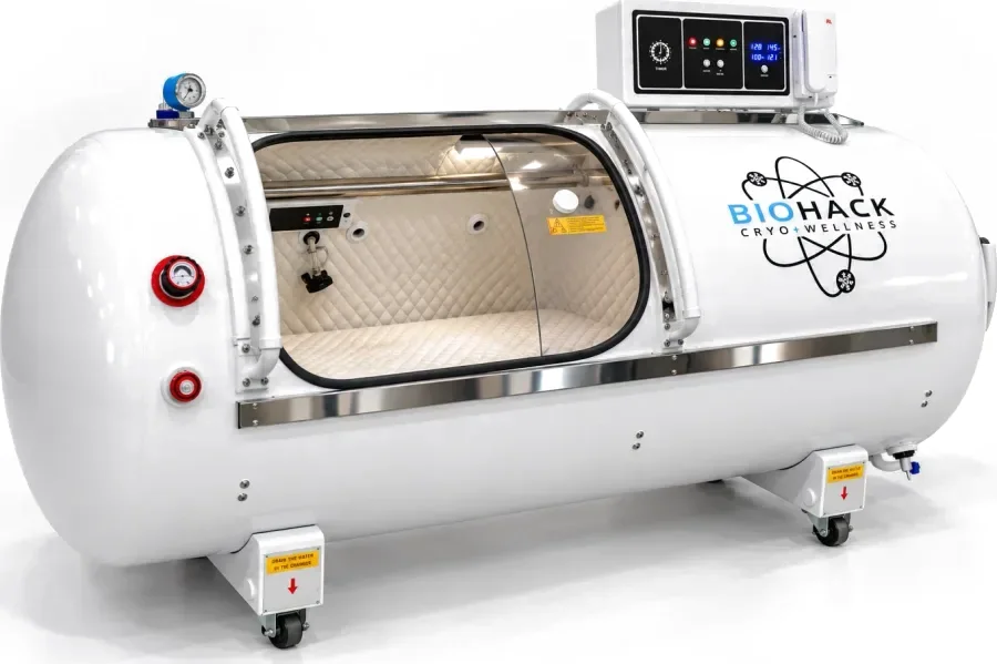 Our hardshell hyperbaric oxygen (HBOT) chamber with the Biohack Cryo + Wellness logo